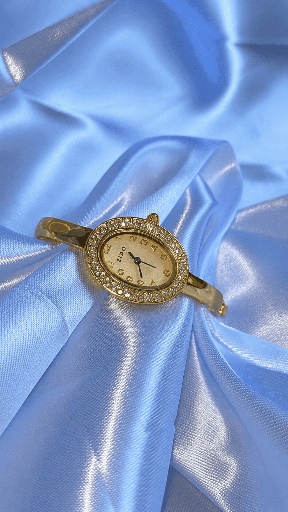 Relógio Feminino Dourado com Zircônias e Pulseira Rígida